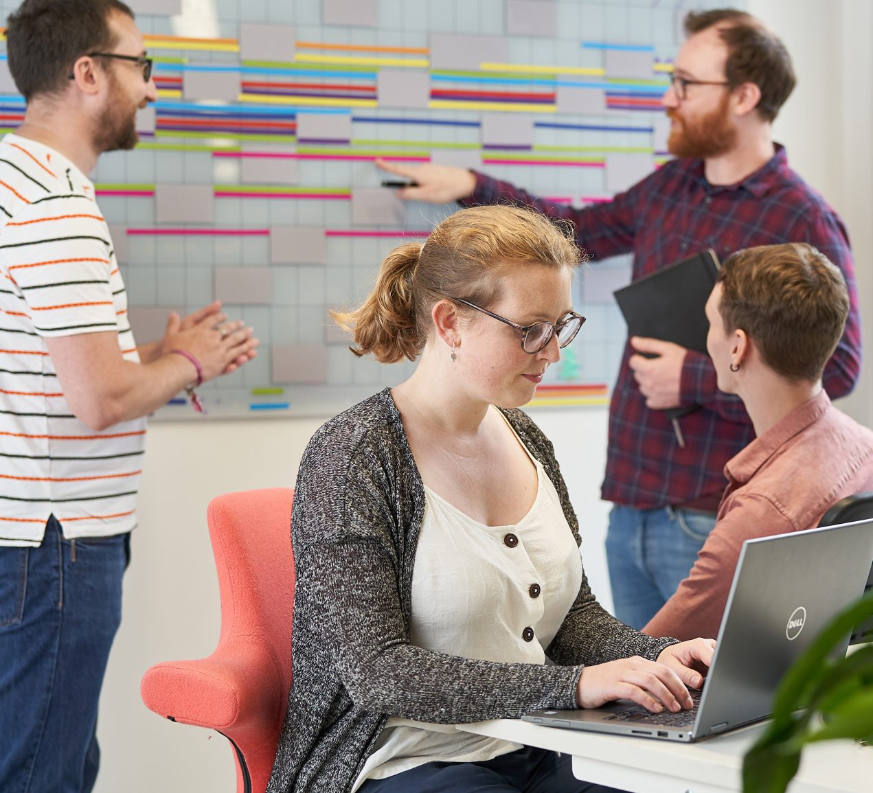 Helastel employees working in the office